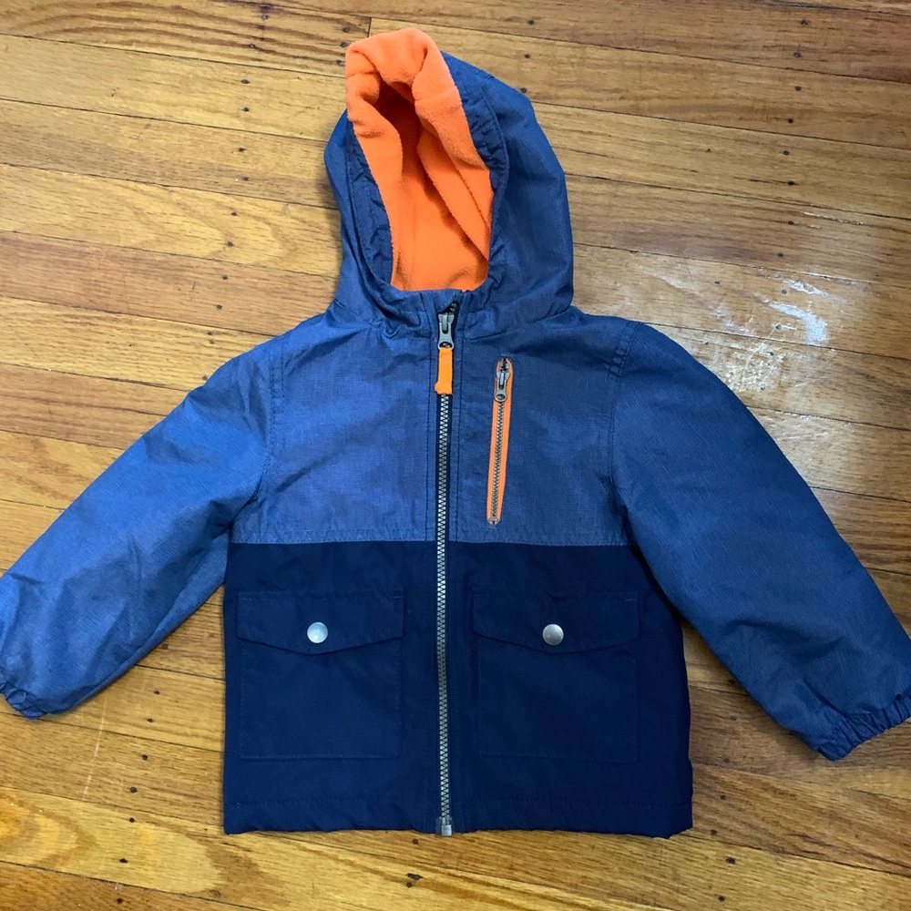 Carter’s boy’s blue and orange lined windbreaker